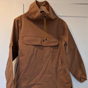 Brown anorak with removable sleeves, front pocket